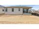 Newly constructed home featuring a backyard with a patio at 9742 Cathay St, Commerce City, CO 80022