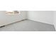 Clean bedroom features plush carpeting, base trim, and bright natural light at 9742 Cathay St, Commerce City, CO 80022