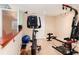 Spacious exercise room with workout equipment and ample space for activities at 4814 S Upham Ct, Littleton, CO 80123