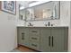 Stylish bathroom featuring a dual sink vanity with modern fixtures and ample storage at 19131 E Garden Pl, Centennial, CO 80015
