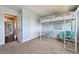 Cozy bedroom with a white loft bed, complemented by sliding closet doors and light blue walls at 19131 E Garden Pl, Centennial, CO 80015