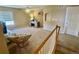 Upstairs view of the bedroom, showing a chair, a desk and carpeted flooring at 4614 Lyndenwood Cir, Highlands Ranch, CO 80130