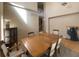 Cozy dining room with tall ceilings, lots of natural light, and room to entertain at 4614 Lyndenwood Cir, Highlands Ranch, CO 80130