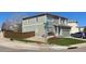 Attractive two-story home featuring a manicured lawn and inviting curb appeal at 4614 Lyndenwood Cir, Highlands Ranch, CO 80130