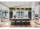 Well-lit kitchen with a large island and seating, perfect for cooking and gathering with Gathering and friends at 21429 Trappers Trl, Morrison, CO 80465