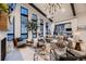 Spacious living room featuring high ceilings, large windows, and modern décor at 21429 Trappers Trl, Morrison, CO 80465