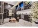 Modern black marble tiled shower with plants, a wooden bench and hexagon tiled floor at 21429 Trappers Trl, Morrison, CO 80465