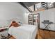 Bedroom boasts hardwood floors, high ceilings and an open closet for added storage at 1555 California St # 419, Denver, CO 80202