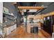 Spacious kitchen with wood cabinets and modern appliances, integrated seamlessly into an open concept living space at 1555 California St # 419, Denver, CO 80202