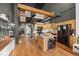 Bright kitchen featuring wood cabinets, a spiral staircase, and contemporary design elements for a stylish living space at 1555 California St # 419, Denver, CO 80202