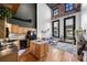 Open living area highlighting the spacious layout, connecting the kitchen and living room with abundant natural light at 1555 California St # 419, Denver, CO 80202