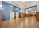 Large lobby with elevators, wood trim, and tiled floors provides a welcoming entrance at 1555 California St # 419, Denver, CO 80202