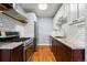 Updated kitchen with stainless steel appliances, granite countertops, and modern white subway tile backsplash at 1060 N Washington St # 103, Denver, CO 80203