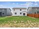 Spacious backyard with new construction homes at 1368 Orchard St, Brighton, CO 80601