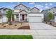Charming two-story home featuring a two-car garage and well-maintained landscaping at 1368 Orchard St, Brighton, CO 80601