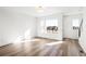 Bright and airy living room with hardwood floors and large windows at 2672 W 68Th Ave, Denver, CO 80221