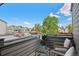Cozy outdoor balcony with seating, offering a peaceful retreat with neighborhood views at 11 W Ellsworth Ave # 22, Denver, CO 80223