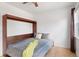 Bedroom features a space-saving Murphy bed and great natural light at 11 W Ellsworth Ave # 22, Denver, CO 80223
