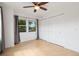 This light-filled bedroom features hardwood floors, double-door closets, and backyard views at 11 W Ellsworth Ave # 22, Denver, CO 80223