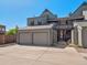 Spacious two-car garage with an attached unit featuring a gray exterior and ample parking at 11 W Ellsworth Ave # 22, Denver, CO 80223