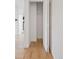 Open hallway closet with hardwood floors at 11 W Ellsworth Ave # 22, Denver, CO 80223