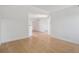 Clean, open-concept living space with hardwood floors and fresh white paint at 11 W Ellsworth Ave # 22, Denver, CO 80223