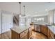 Well-equipped kitchen with granite countertops and stainless steel dishwasher, sink and faucet at 6493 W 98Th Ct, Westminster, CO 80021