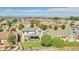 Aerial view of home featuring a backyard, landscaping, and neighborhood at 12400 Village Cir, Brighton, CO 80603