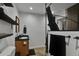 Bathroom featuring a walk-in shower, floating shelves, and modern decor at 12400 Village Cir, Brighton, CO 80603