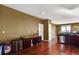 Spacious kitchen with an adjacent nook and modern stainless steel appliances at 12400 Village Cir, Brighton, CO 80603