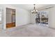 Dining room with access to a deck and kitchen at 6415 Trailhead Rd, Highlands Ranch, CO 80130