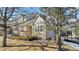 Exterior view of charming two-story home with deck and landscaping at 6415 Trailhead Rd, Highlands Ranch, CO 80130