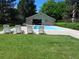 Inviting pool area with lounge chairs and a covered pool house, perfect for relaxing and enjoying the outdoors at 14740 E Kentucky Dr # 725, Aurora, CO 80012