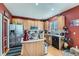 Kitchen with stainless steel appliances and an island at 1752 E 164Th Pl, Brighton, CO 80602