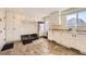 Functional mud room with ample storage, white cabinets, and convenient hooks for organization and daily living at 7440 W 94Th Pl, Westminster, CO 80021