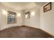 This bedroom offers natural light and is carpeted. Ready for personalized touches and relaxation at 29266 S Sunset Trl, Conifer, CO 80433