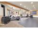 Spacious home gym featuring exercise equipment and a unique rustic design at 29266 S Sunset Trl, Conifer, CO 80433