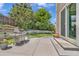 Outdoor grill and landscaped backyard, perfect for outdoor cooking and entertaining with room for relaxation at 2938 S Zeno Way, Aurora, CO 80013