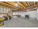 Unfinished basement featuring exposed beams and ductwork, offering lots of potential at 2938 S Zeno Way, Aurora, CO 80013