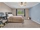 Cozy bedroom with a bed, window and natural light at 2938 S Zeno Way, Aurora, CO 80013