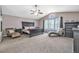 Spacious main bedroom featuring a vaulted ceiling, elegant furnishings, and an abundance of natural light at 2938 S Zeno Way, Aurora, CO 80013