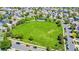 Aerial view of neighborhood park with playground and lots of green space at 9758 Laredo St # 35B, Commerce City, CO 80022