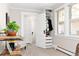 Well-lit bedroom with custom closet, providing ample storage at 910 Steele St, Denver, CO 80206