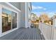 Backyard deck with railing and sliding glass doors at 13694 Cherry St, Thornton, CO 80602