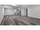 Large basement with wood-style flooring, recessed lights, and white walls at 13694 Cherry St, Thornton, CO 80602