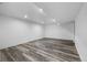 Basement with recessed lighting and wood-style flooring at 13694 Cherry St, Thornton, CO 80602