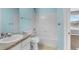 A full bathroom with a shower and blue walls at 13694 Cherry St, Thornton, CO 80602