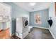 Bright laundry room with washer and dryer at 13694 Cherry St, Thornton, CO 80602
