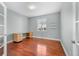 Office with hardwood floors, neutral paint and ample natural light at 13694 Cherry St, Thornton, CO 80602