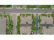 A tranquil aerial view of a residential area with well-maintained buildings and lush landscaping at 10087 E Hawaii Pl, Aurora, CO 80247